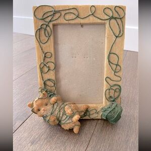 Cat caught in yarn photo frame